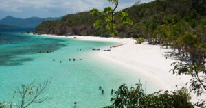 Read more about the article Malcapuya Island: White Sands and Crystal Waters