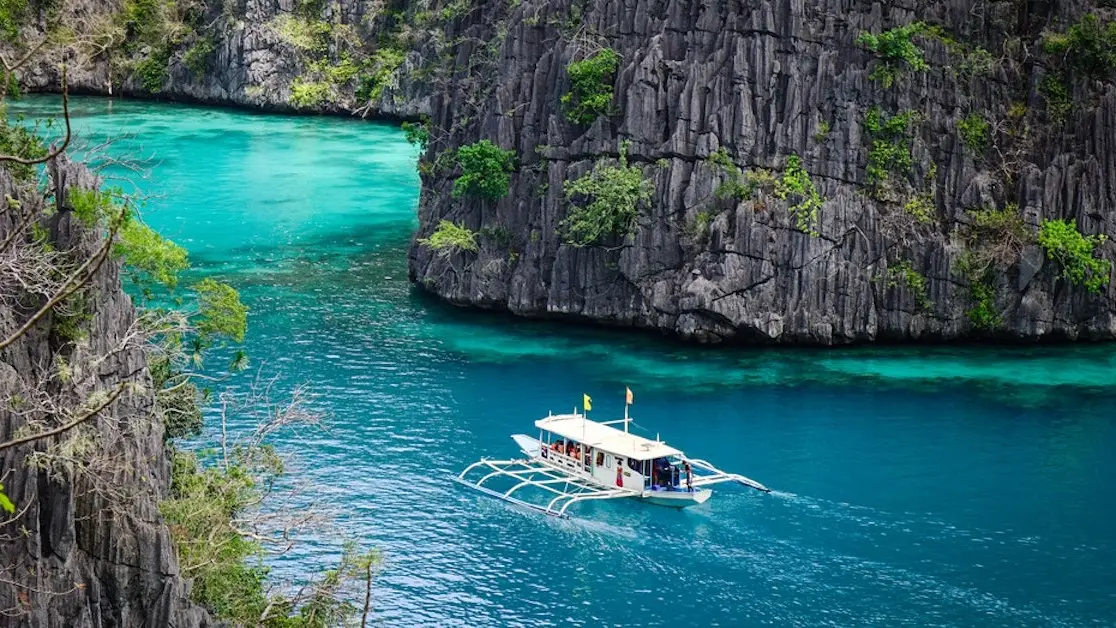 3 day expedition el nido coron boat private tour sailing through limestone cliffs