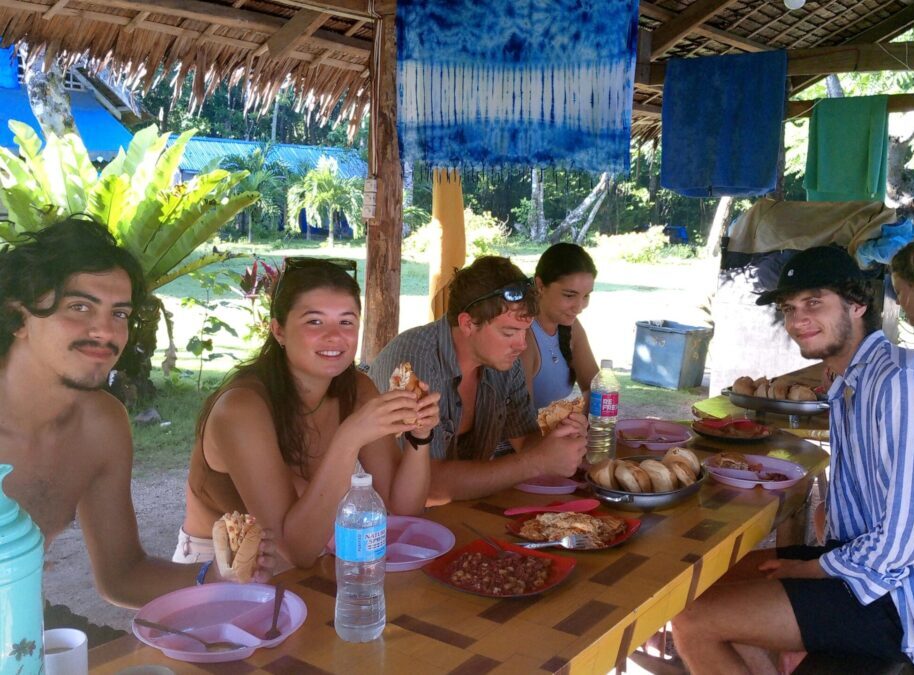 Contact Us: Green Gecko Expeditions and Hostel 2 Green Gecko clients eating a meal during the 3-day El Nido to Coron Expedition on a sunny day. Discover Green Gecko Expeditions!